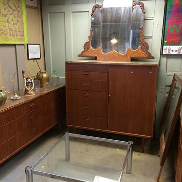 Mid century dresser with tambour door. One of four mid century dresser's currently in stock