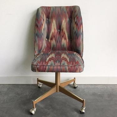 vintage flame stitch rolly chair.