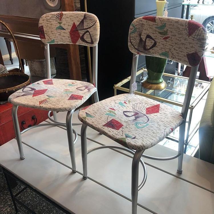 I air of Heywood Wakefield chairs covered in funky fabric! 