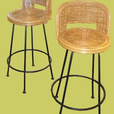 Pair of Rattan Swivel Bar Stools with Wrought Iron Base ~ $350 for the pair.