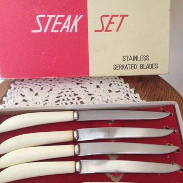 Vintage set of 6 stainless Samurai Sword  steel faux ivory steak knives by Federal Cutlery Japan 