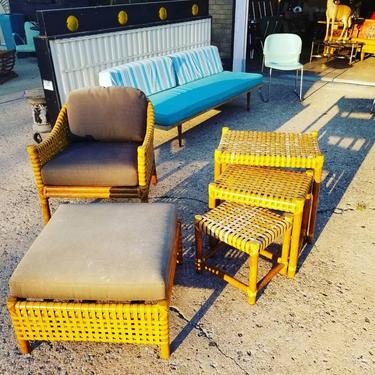 Leather strapped nesting tables $300. Leather strapped chair with matching ottoman $350