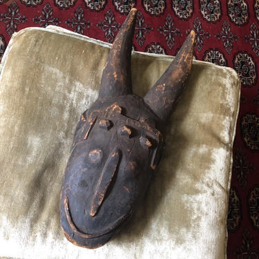 old hand carved African tribal mask | wooden totem mask with horns 