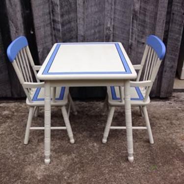 Adorable vintage child's table and chairs. $150