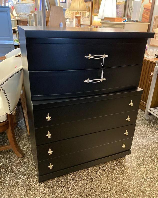 Mid century chest of drawers with a nod to New Orleans. Black painted 4 drawer chest by Bassett. 32” x 18.5” x 43.25”