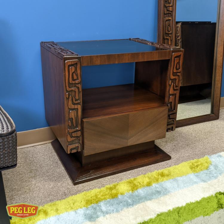 Mid-Century Modern walnut nightstand with sculpted details