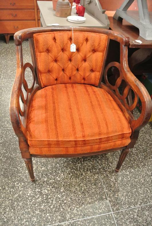 Orange chair. Two available. $95/each.