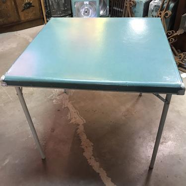 Cute vintage card table with green vinyl top
