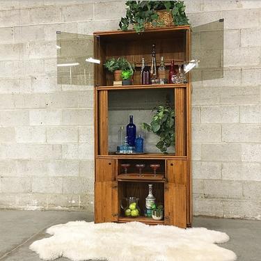 LOCAL PICKUP ONLY Vintage Cabinet Retro 1990s Brown Wood Tinted Glass Front Tv or Bar Cabinet with Accordion Doors + Light Fixture + Drawers 