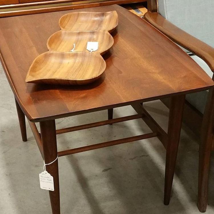 Lovely mid-century side table with turn-up edging by Bassett. $125.