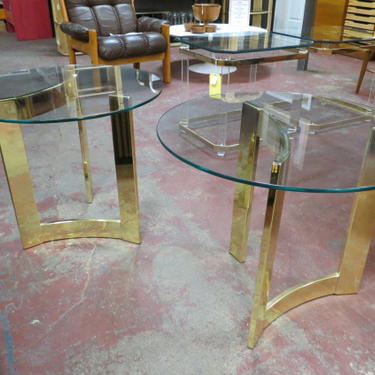 Vintage MCM pair of brass and glass side tables