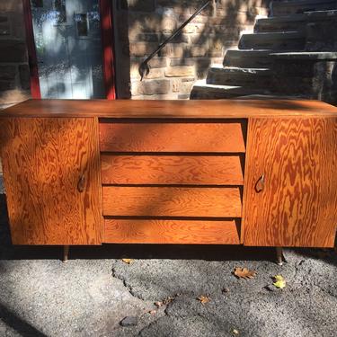mid century sideboard with cabinets and 4 drawers
