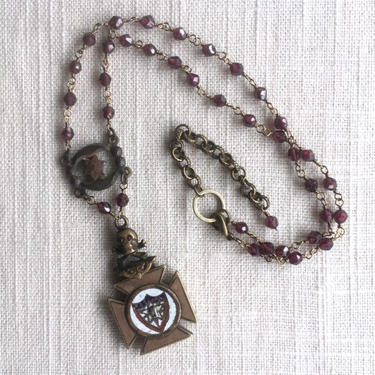 Skull, Bones &amp; Secrets [assemblage necklace: antique fob, cut steel, garnet] 
