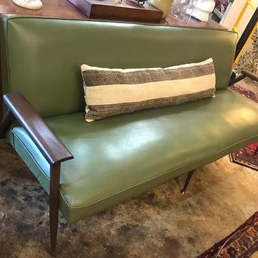 Mid Century Modern pea green sofa, with metal tapered legs and walnut armrests. 70 L x 28 D. 