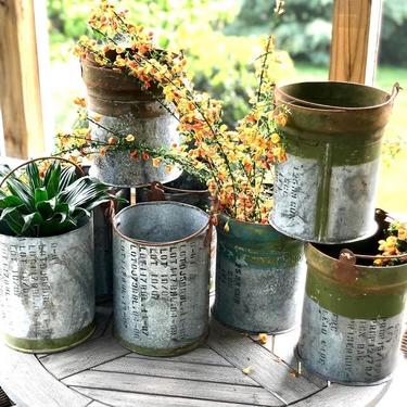 Unique Recycled Ammunition Canisters turned Planters/Containers