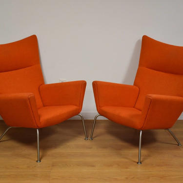 Hans J. Wegner CH445 Orange Lounge Chairs - A Pair 