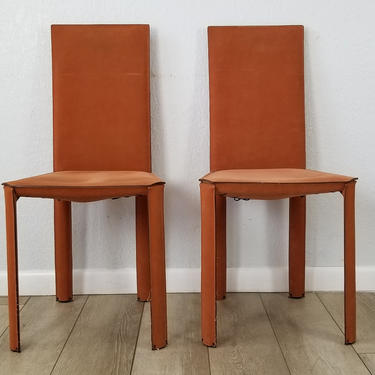 A Pair of Leather Chairs by De Couro of Brazil . 
