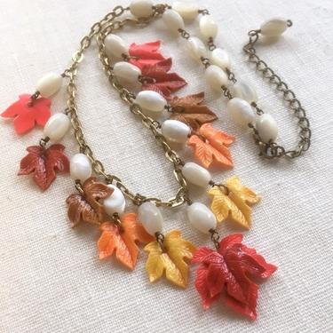 Autumn Equinox [assemblage necklace: 1940s plastic leaves, mother of pearl, vintage chain] 