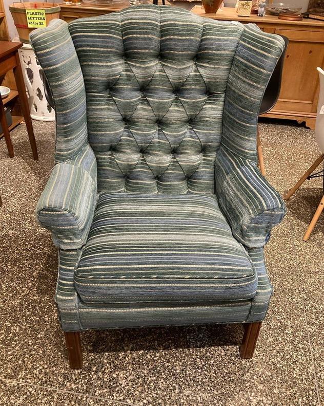 Tufted upholstered wing back chair. 33” x 34” x 42” seat height 18” seat depth 22” 