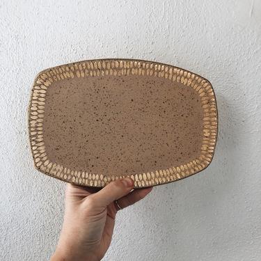 Speckled peach stoneware and gold dash decorative oval tray. The Object Enthusiast. Ceramic tray, vanity or bathroom tray. Jewelry tray. 