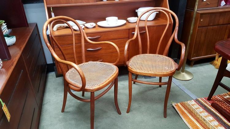 Pair of vintage bentwood Thonet-style armchairs with cane seats