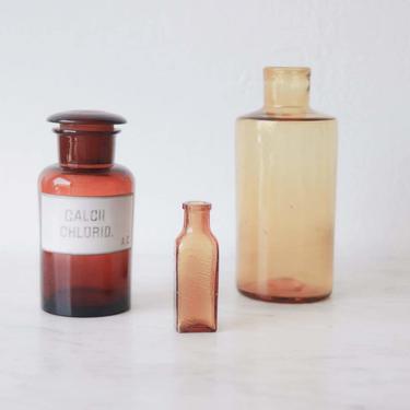 Trio of Vintage Amber Glass Pharmacy Jars