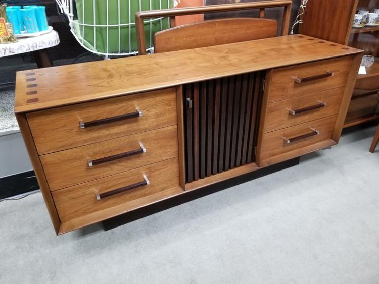                   Mid-Century Modern nine drawer dresser from the Tower collection by Lane
