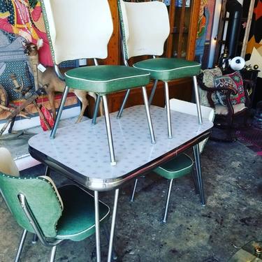 1950s kitchen table with 4 chairs.