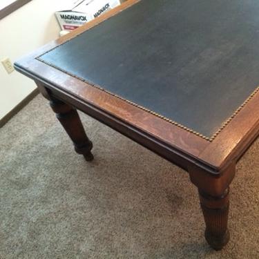 Antique oak and leather conference table