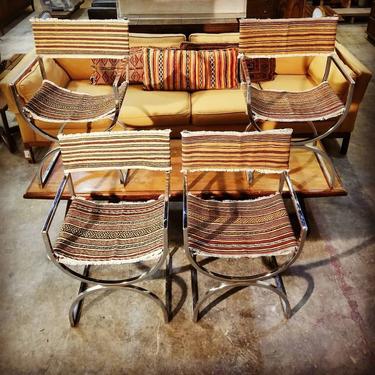 Set of dining chairs, upholstered by Cody Raum. $500. 