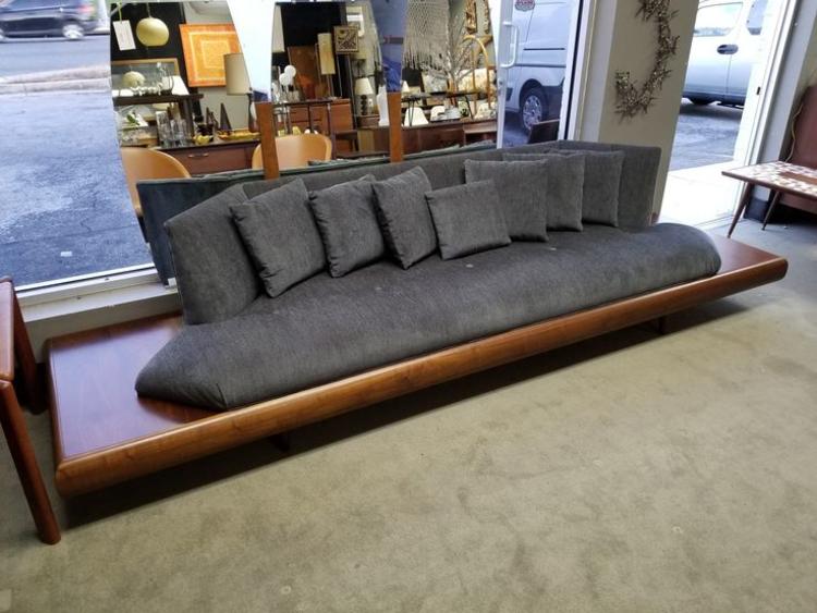 Amazing Mid-Century Modern floating sofa with built-in side tables by Adrian Pearsall