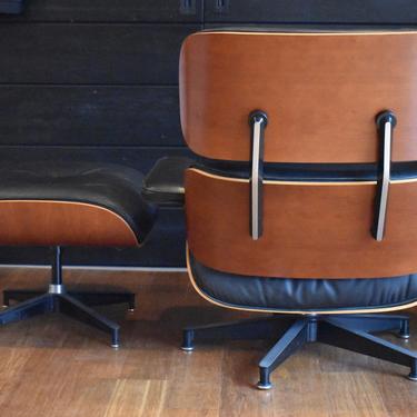 Vintage Eames lounge chair and ottoman by Herman Miller, circa 1990s 