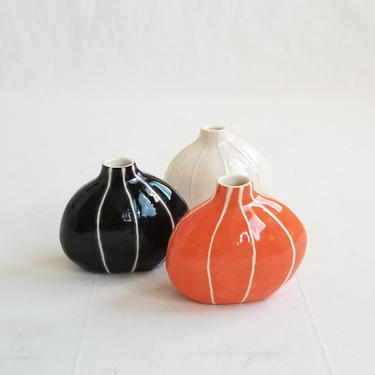 Bud vase in Halloween colors, orange and black 