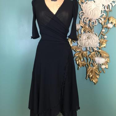 1990s dress, betsey Johnson, sheer black dress, vintage 90s dress, stretchy net, wrap style, puff shoulders, small, fit and flare, feminine 