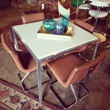                   MCM chrome base and formica table with 4 chairs. $375