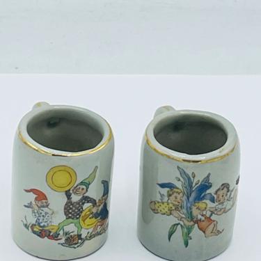 Vintage Set of (2) Miniature  Stoneware Mugs Germany- Gnomes and fairies or Cherubs 