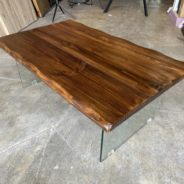 Floating wood and glass coffee table 