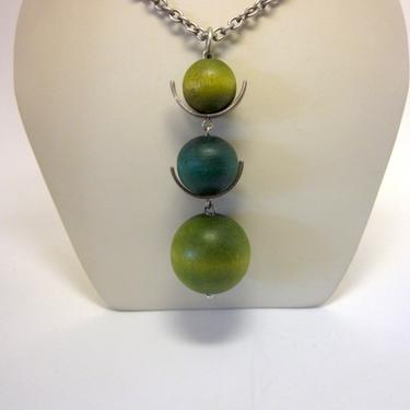 1960s-70s Aarikka Finland Mod Finnish Modernist Wood and Metal Suspended Pendant Necklace with Green and Blue Tones on Rope Length Chain 