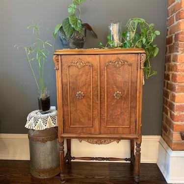 Antique radio cabinet fitted with two shelves