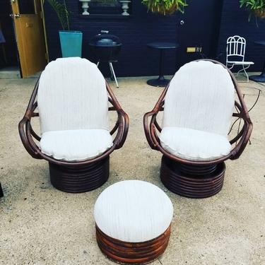 Pair of 1970s rattan swivel chairs with ottoman. $350