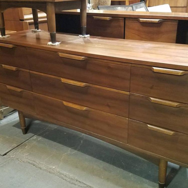 Mid-century modern nine-drawer dresser, Mainline by Hooker. Matching tall chest and nightstand also available. $495.