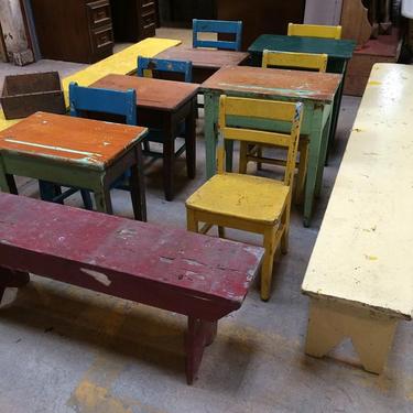 Some vintage wooden child's desks and chairs. And some primitive benches.  Just off the truck so they need some cleaning and love. But great buys, limited supply.