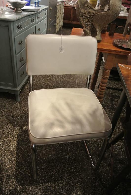 Retro vintage white vinyl chairs. Four available. $75/each