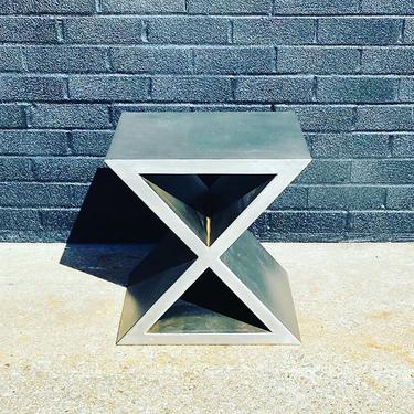 Modern metal side table. Substantial weight and well made 