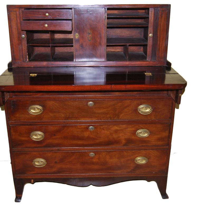 A Federal New England mahogany tambour secretary chest 