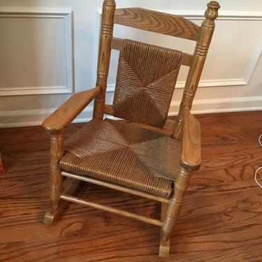 Hand crafted wicker and wood children’s Rocking Chair