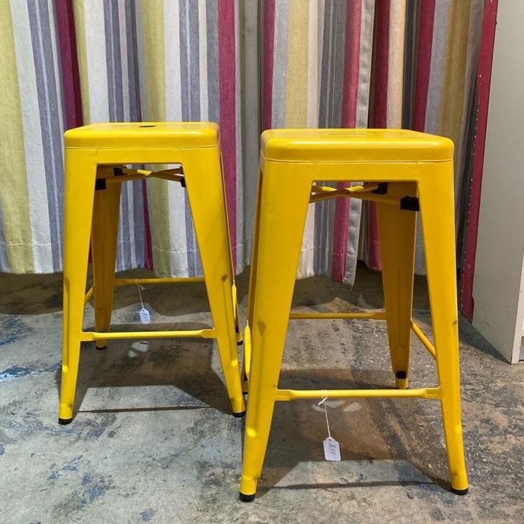 Yellow metal stools. 4 available. 12” squared 24” tall 