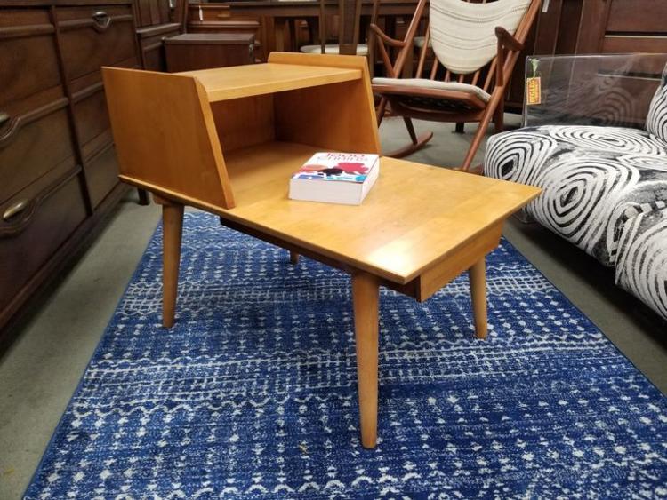                   Mid-Century Modern solid maple step table with lower drawer