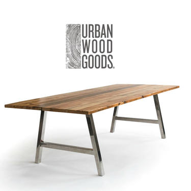 Modern Farmhouse Dining Table made with reclaimed wood planks and stainless steel A frame base.  Custom sizes and finishes welcome. 