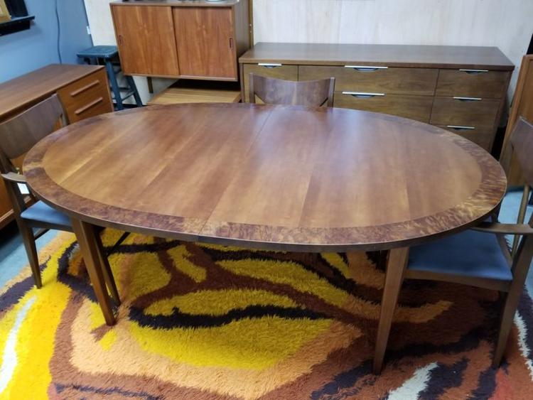 Mid-Century Modern oval walnut dining table with 2 18"leaves